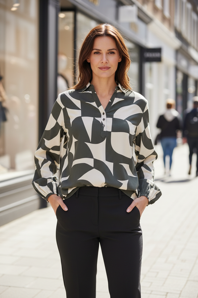 Female model wearing the blouse on a stylish urban street