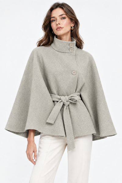 Model wearing the light grey belted cape