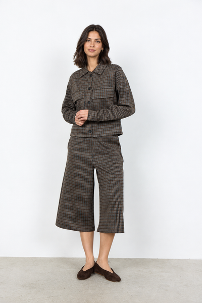 Checked jacket on new female model, third angle